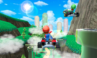 Mario and Luigi go off the ramp in Rock Rock Mountain from an E3 2010 build of Mario Kart 7.