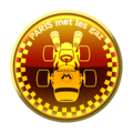 A gold badge that depicts the B Dasher
