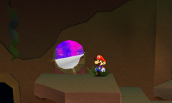 Mario near the Burrow Door scrap in Rustle Burrow of Paper Mario: Sticker Star.