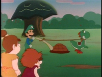 Luigi shows the cave people how to plow.