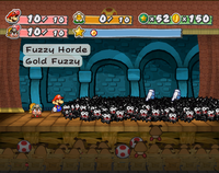 Mario and Goombella battling Fuzzy Horde in Shhwonk Fortress.