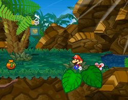 Mario getting a Spite Pouch from a bush in Keelhaul Key of Paper Mario: The Thousand-Year Door.