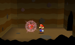 Mario near a HP-Up Heart in Tree Branch Trail of Paper Mario: Sticker Star.