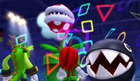 A Piranha Plant and a Chain Chomp prepare to attack Knuckles and Vector