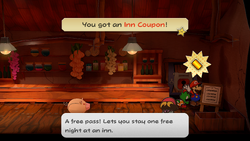 Mario getting the Inn Coupon from behind a sign in Twilight Town of Paper Mario: The Thousand-Year Door for Nintendo Switch.