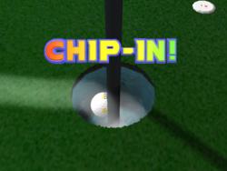 Wario achieves a Chip-In on a hole.