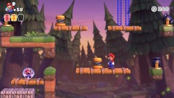 Screenshot of Mystic Forest level 7-6 from the Nintendo Switch version of Mario vs. Donkey Kong