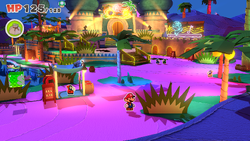 Mario standing near a bush with a coin behind it in Shroom City of The Origami King.