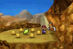 Mario finding a Star Piece  in the northwestern area in Mt. Rugged in Paper Mario