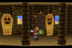 Mario finding Spike Shield Badge in Dry Dry Ruins of Paper Mario.