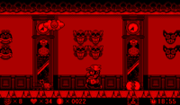 Screenshot of Wario with two Coo-Coos and bombs, from Virtual Boy Wario Land.