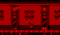 Screenshot of Wario with two Coo-Coos and bombs, from Virtual Boy Wario Land.