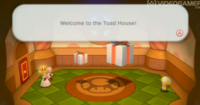 Screenshot of a Toad House from Super Mario 3D World.