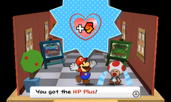 Mario getting a HP-Up Heart from a Toad in Decalburg of Paper Mario: Sticker Star.