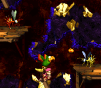 Squawks spits a coconut at a Zinger in Squawks's Shaft from Donkey Kong Country 2: Diddy's Kong Quest