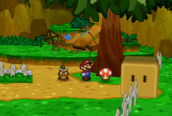 Mario finding a Mushroom in near the fence in the area behind Goomba Village of Paper Mario.