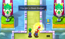 Mario receiving the Bean Badge in Mario & Luigi: Superstar Saga and Mario & Luigi: Superstar Saga + Bowser's Minions