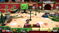 Mario in the left of lower red district, around objects containing Coins in Port Prisma of Paper Mario: Color Splash.