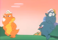 An animation error in the Super Mario World episode King Scoopa Koopa, causing a dark green Rex to become an anthropomorphic Dino-Rino/Dino-Torch for a couple shots.