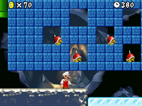Fire Mario runs under several Spike Tops in a level in New Super Mario Bros.