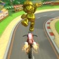 Gold Mario doing a trick off the anti-gravity section