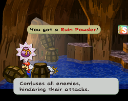 Mario getting a Ruin Powder from behind a barrel in Pirate's Grotto of Paper Mario: The Thousand-Year Door.