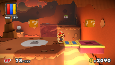Mario in front of the revealed platform in Redpepper Crater of Paper Mario: Color Splash.