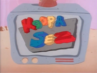 Title card for Koopa Sez in the Super Mario World television series episode "Rock TV"