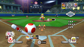 A Red Toad prepares to bat in Mario Super Sluggers.