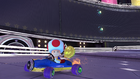 Toad riding the Mach 8 on the track.