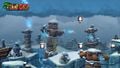 The Kongs must dodge large snowflakes while launching through Barrel Cannons.