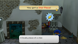 Mario getting the Star Piece behind the right pillar in the center room at level 1 of Rogueport Underground in the remake of the Paper Mario: The Thousand-Year Door for the Nintendo Switch.