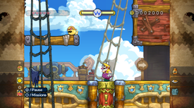 Wario near the golden enemy in Aboard the Sweet Stuff