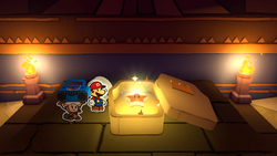 Mario standing near a coffin containing a Super Star in Temple of Shrooms of The Origami King.