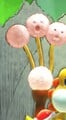 Scatterpuffs parasitizing an apple