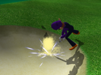 Waluigi attempts to hit the ball out of a bunker in Mario Golf: Toadstool Tour.