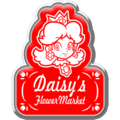 A Daisy's Flower Market badge from Mario Kart Tour