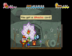 Luigi holding the 300 Shop Point reward in Super Paper Mario.