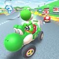 Yoshi drifting in the Turbo Yoshi on the R variant with Toad and Toadette behind
