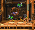 The Kongs encounter two green Buzzes surrounding a Sneek, just before the letter N