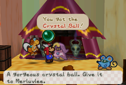 Mario receiveing Crystal Ball from Merlee in Dry Dry Outpost of Paper Mario.