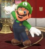 Mario wearing the Luigi cap and outfit in Super Mario Odyssey