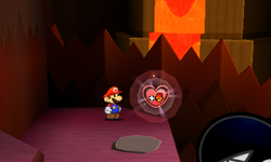Mario near a HP-Up Heart in Rumble Volcano of Paper Mario: Sticker Star.
