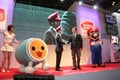 Hideki Konno along with Don-chan, Kei Kobayashi and Mario at Japan Amusement Expo 2013