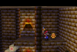 Mario finding an Artifact in Dry Dry Ruins of Paper Mario.