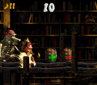 Diddy flees from the final, purple-bandanna Kackle in Haunted Hall of Donkey Kong Country 2: Diddy's Kong Quest.