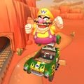 Wario tricking in the Flame Flyer