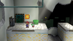 Mario next to the Shine Sprite to the left of the west entrance of Rogueport Underground in the remake of the Paper Mario: The Thousand-Year Door for the Nintendo Switch.