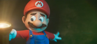 Mario about to fall into the pipe that will lead him into the Warp Zone.