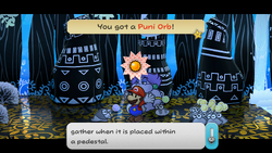 Mario getting the Puni Orb from Puni Elder in The Great Tree of Paper Mario: The Thousand-Year Door for Nintendo Switch.